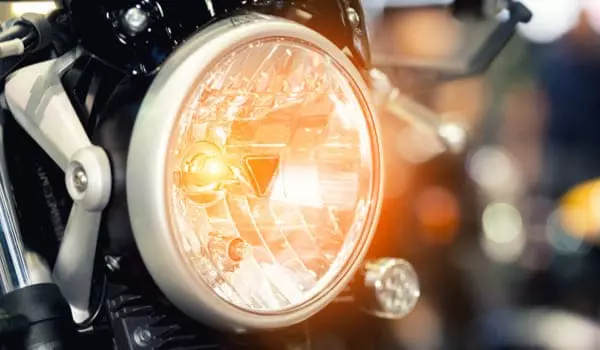 Phare moto rond chromé vintage